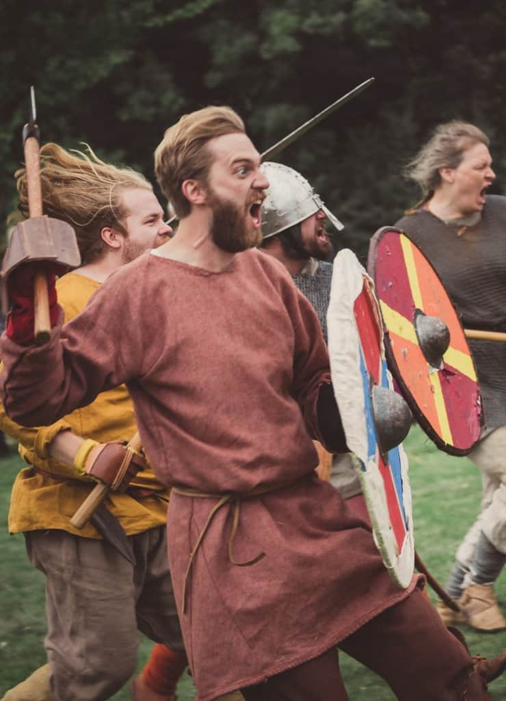 This image shows a charge of wariors with weapons brandished.